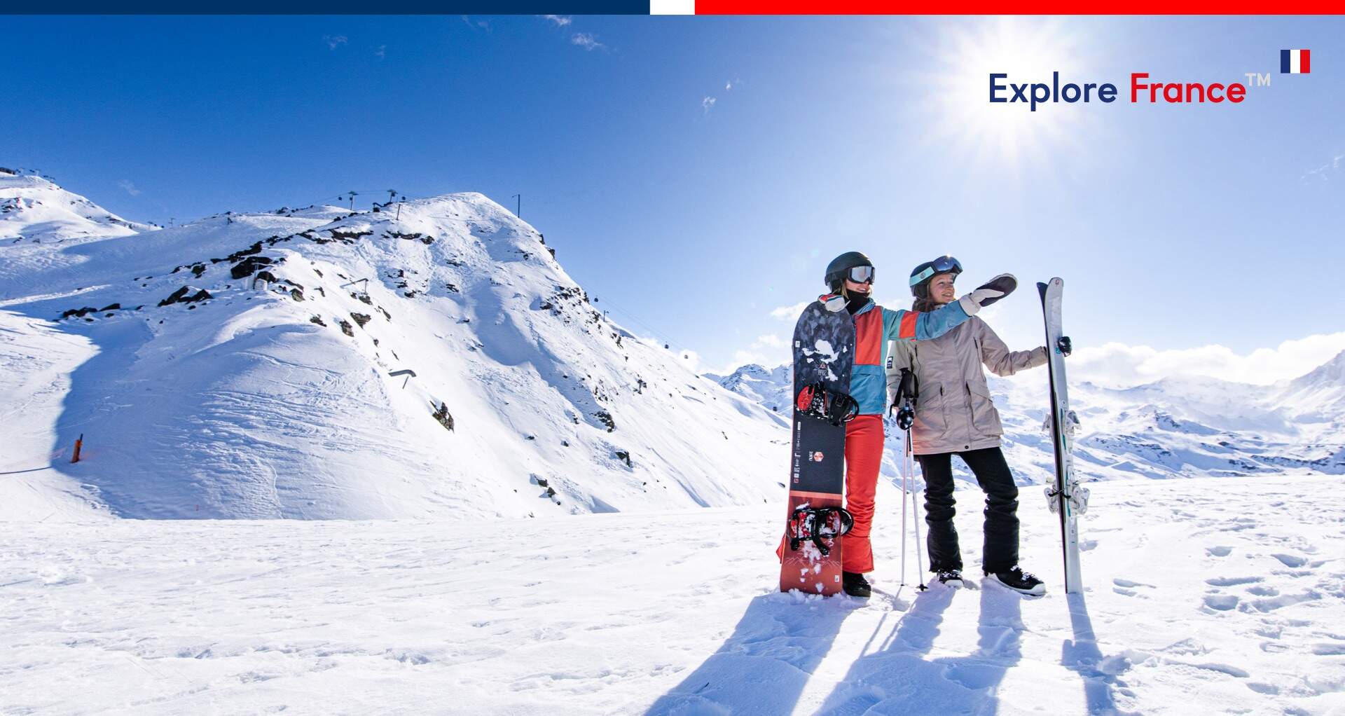 2 Snowboarder auf der Skipiste